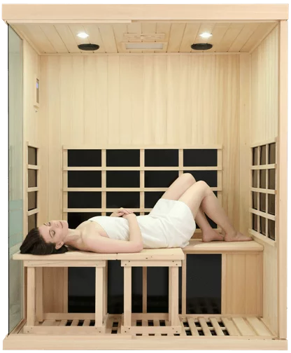 Open front view of 3 person infrared sauna with lady laying horizontal or down inside